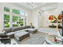 Bright living room boasts large windows and an open concept floor plan at 801 Aquitaine Ct, Las Vegas, NV 89145