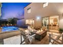Outdoor space with a pool, fire pit, patio area, and a built-in grill, perfect for entertaining at 2710 Marchetti Pl, Henderson, NV 89044