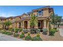 Inviting exterior showcasing a well-maintained front yard, covered entry, and appealing architecture at 3514 Punta Tersiva Ln, Henderson, NV 89044