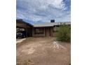 Charming single-story home with a covered parking area and a low-maintenance yard at 3933 Lighthouse Ave, Las Vegas, NV 89110