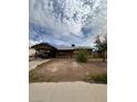 Charming single-story home with a covered parking area and a low-maintenance yard at 3933 Lighthouse Ave, Las Vegas, NV 89110