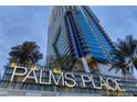 Exterior shot of the Palms Place building with prominent signage and modern architectural design at 4381 W Flamingo Rd # 5318, Las Vegas, NV 89103