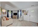 Inviting living room featuring tile floors and a comfortable seating area at 604 I, Boulder City, NV 89005