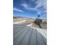 Backyard view with pool covered for the winter at 6726 Montezuma Castle Ln, North Las Vegas, NV 89084