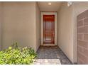 Inviting front entry featuring a brick walkway and covered porch at 6934 Alexandrite Peak St, Las Vegas, NV 89148