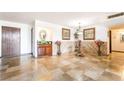 Welcoming entryway featuring tiled floors, wood accents, and decorative touches at 750 S Royal Crest Cir # 317, Las Vegas, NV 89169