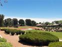 Beautiful view of the lush green golf course and surrounding landscape at 9369 Villa Ridge Dr, Las Vegas, NV 89134