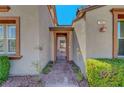Inviting entrance showcasing a covered doorway with stone walkway and landscaped accents at 11356 Belmont Lake Dr # 103, Las Vegas, NV 89135