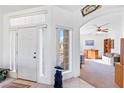 Bright and welcoming foyer with tile flooring and view of the living space at 1199 Golf Club, Laughlin, NV 89029