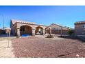 Spacious backyard with a covered patio, perfect for outdoor entertaining and relaxation at 1713 Golden Sky Dr, Las Vegas, NV 89106