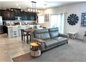Open floor plan showcasing the kitchen, dining and living room areas at 2585 Amazing Meadows Ave # 1007, North Las Vegas, NV 89031