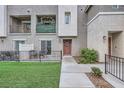 Charming townhome featuring a cozy patio and inviting front entrance at 2845 Copper Wind Ln # 4, Las Vegas, NV 89183