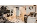 Comfortable living room with modern flooring and neutral decor at 2845 Copper Wind Ln # 4, Las Vegas, NV 89183