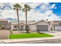 Lovely single-story home features desert landscaping and a two-car garage at 7413 Red Eagle St, Las Vegas, NV 89131