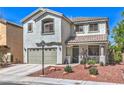 Charming two-story home with a well-maintained front yard, landscaped with a desert style at 11143 Castellane Dr, Las Vegas, NV 89141