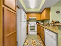 Bright kitchen with modern appliances and lots of light, featuring an updated sink and countertops at 1455 E Katie Ave # K14, Las Vegas, NV 89119