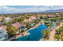 Beautiful aerial view overlooking community, lake, and lush landscaping at 2209 Glenbrook Way, Las Vegas, NV 89117