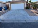View of the concrete driveway leading up to the house at 2839 Kensington St, Las Vegas, NV 89156