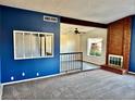 Inviting living room with fireplace, and view into living area at 3729 La Junta Dr, Las Vegas, NV 89120
