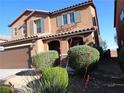 Charming two-story home featuring low-maintenance landscaping and a well-manicured front yard at 4361 Duck Harbor Ave, North Las Vegas, NV 89031