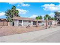 Single story home with desert landscaping, and a red brick driveway at 5162 Somerset Dr, Las Vegas, NV 89120