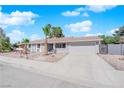 Single story home featuring palm trees and a well maintained front yard at 5162 Somerset Dr, Las Vegas, NV 89120