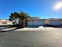 Charming single-Gathering home featuring a three-car garage, desert landscaping, and a well-maintained front yard at 5704 Burdel St, Las Vegas, NV 89149