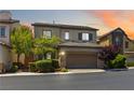 Beautiful two-story home with stone accents, neutral tones, and well-maintained landscaping at 6731 Sumatra St, Las Vegas, NV 89166