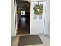 Inviting entryway with natural light, leading to the living areas at 7650 Butterscotch Ct, Las Vegas, NV 89131