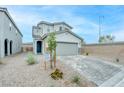 Attractive two-story home featuring a well-maintained xeriscaped front yard at 8909 Cherry Barn St, Las Vegas, NV 89113