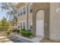 Attractive condo featuring manicured landscaping and an inviting, private entryway at 10001 Peace Way # 2351, Las Vegas, NV 89147