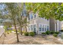 Charming two-story condo with well-maintained landscaping and beautiful stone accents at 10001 Peace Way # 2351, Las Vegas, NV 89147