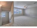 Cozy upstairs bonus room with carpet, ceiling fan, and windows offering plenty of natural light at 1525 Spiced Wine Ave # 19103, Henderson, NV 89074