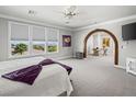 Bright, spacious bedroom with large windows offering scenic views and a cozy seating area at 220 Villa Borghese St, Las Vegas, NV 89138