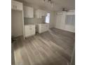 Spacious room with natural lighting, wood floors, and ceiling fan at 321 Beaumont St, Las Vegas, NV 89106