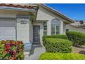 Inviting entrance to a cozy home, showcasing a tidy front garden at 4924 Cedar Lawn Way, Las Vegas, NV 89130