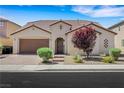 Beautiful home showcasing desert landscaping, a tile roof, and a brick driveway at 5713 Silver Cascade Ave, Las Vegas, NV 89131