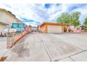 Spacious driveway, garage access, with room for multiple vehicles and possible RV parking at 632 Arrayo Way, Boulder City, NV 89005