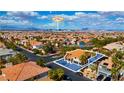 An aerial view showcases the property's location within a residential neighborhood and proximity to the Las Vegas Strip at 7616 Gossamer Wind St, Las Vegas, NV 89139