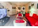 Inviting living room with comfortable seating and warm, neutral decor at 8324 W Charleston Blvd # 1036, Las Vegas, NV 89117