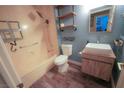Modern bathroom with stylish vanity, vessel sink, and bathtub with shower at 9000 Litchfield Ave, Las Vegas, NV 89134