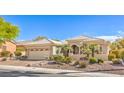 Attractive single-story home with desert landscaping, and a two-car garage in a well-kept neighborhood at 10314 Premia Pl, Las Vegas, NV 89135