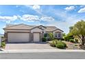 Lovely single-story home featuring desert landscaping and a convenient three-car garage at 1613 Williamsport St, Henderson, NV 89052