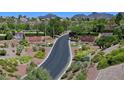 Scenic entrance to a Primary-planned community with lush landscaping and a grand entryway at 2056 Oliver Springs St, Henderson, NV 89052