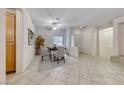 Dining area features modern table and chairs with natural light at 2056 Oliver Springs St, Henderson, NV 89052