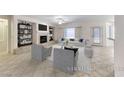 Bright living room features fireplace, built-in shelves, and large window at 2056 Oliver Springs St, Henderson, NV 89052