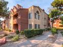 Beautiful exterior view of the apartments with landscaped grounds and walkways, providing a peaceful environment at 2200 S Fort Apache Rd # 2071, Las Vegas, NV 89117