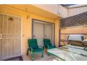 Private patio with seating and a grill, ideal for outdoor dining at 255 N Lamb Blvd # D, Las Vegas, NV 89110