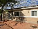 Lovely single-story home with desert landscaping and neutral-colored facade at 3349 Partridge Run St, Laughlin, NV 89029