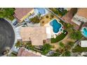 An aerial view showcases the home's pool, spa, backyard, and overall property layout at 8253 Ruby Mountain Way, Las Vegas, NV 89128